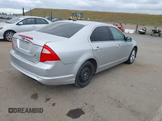 2011 Ford Fusion SEL with VIN 3FAHP0JG3BR330704, listed as a IAAI auction lot 42116994 with 215,020 mi miles. Bid and sale history available at carsss.com. Image 4.