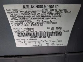2013 Ford Taurus SEL with VIN 1FAHP2E89DG207904, listed as a IAAI auction lot 42184669 with 147,321 mi miles and . Bid and sale history available at carsss.com. Image 9.