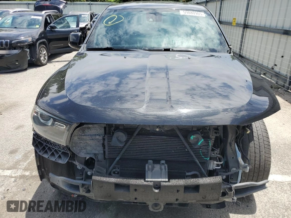 2015 Dodge Durango R/T with VIN 1C4SDHCT3FC907348, listed as a Copart auction lot 59880905 with 141,162 mi miles and Salvage title. Bid and sale history available at DreamBid. Image 5.