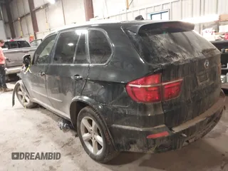 2012 BMW X5 35i with VIN 5UXZV4C50CL757568, listed as a IAAI auction lot 41315024 with 166,825 mi miles and . Bid and sale history available at DreamBid. Image 3.