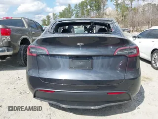 2025 Tesla Model Y Long Range with VIN 7SAYGDED3SA352138, listed as a IAAI auction lot 41760798 with 1,209 mi miles and . Bid and sale history available at DreamBid. Image 15.