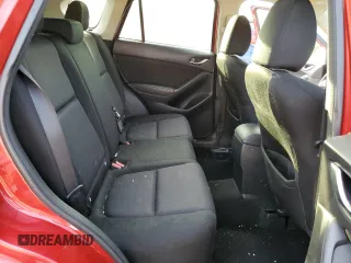 2015 Mazda CX-5 Sport with VIN JM3KE4BE7F0449623, listed as a Copart auction lot 78989944 with 154,156 mi miles and Salvage title. Bid and sale history available at DreamBid. Image 11.