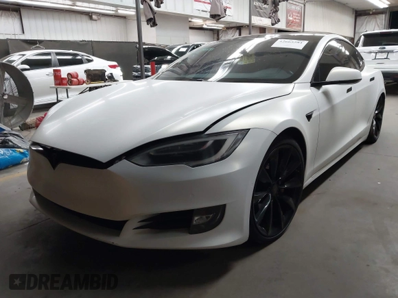 2017 Tesla Model S 100D z VIN 5YJSA1E2XHF224671, wystawiony jako IAAI lot #42665581 z przebiegiem 128 517 mil mil oraz . Historia ofert i sprzedaży dostępna na DreamBid. Obrazek 2.