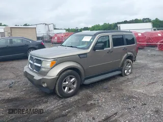 2007 Dodge Nitro SLT z VIN 1D8GT58K07W735904, wystawiony jako IAAI lot #42216665 z przebiegiem 168 000 mil mil oraz . Historia ofert i sprzedaży dostępna na DreamBid. Obrazek 17.