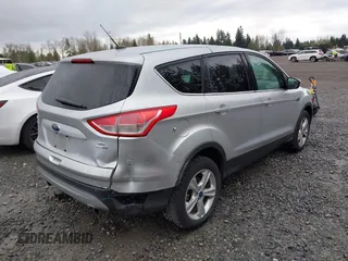 2013 Ford Escape SE with VIN 1FMCU9G94DUC37269, listed as a IAAI auction lot 41896473 with 130,391 mi miles. Bid and sale history available at carsss.com. Image 4.
