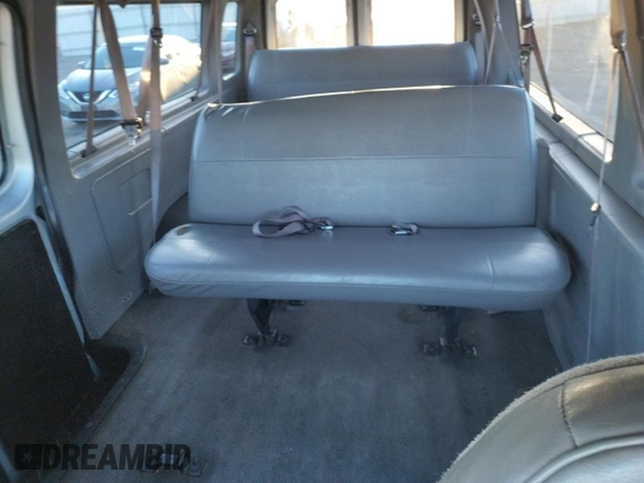 1999 Ford Econoline Passenger XL with VIN 1FBSS31L6XHC07800, listed as a Copart auction lot 83122494 with 96,238 mi miles and Clean Title. Bid and sale history available at DreamBid. Image 10.