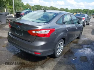 2012 Ford Focus SE z VIN 1FAHP3F22CL125941, wystawiony jako IAAI lot #42176898 z przebiegiem 157 940 mil mil oraz . Historia ofert i sprzedaży dostępna na DreamBid. Obrazek 4.