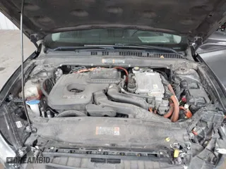 2016 Ford Fusion Energi Titanium with VIN 3FA6P0SU9GR103245, listed as a IAAI auction lot 41888435 with 123,975 mi miles. Bid and sale history available at carsss.com. Image 10.