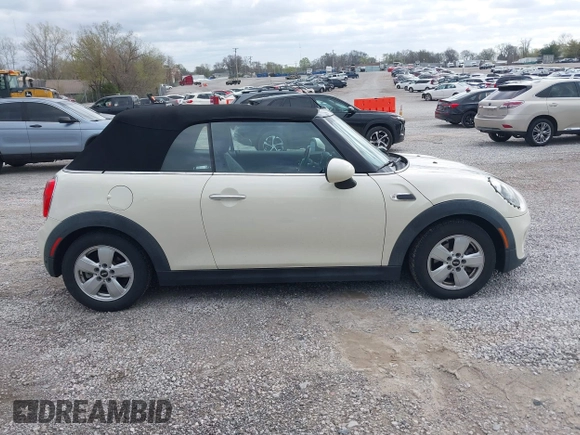 2016 MINI Convertible z VIN WMWWG5C51G3C19178, wystawiony jako IAAI lot #41909039 z przebiegiem 87 533 mil mil oraz . Historia ofert i sprzedaży dostępna na DreamBid. Obrazek 13.