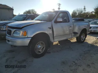 1998 Ford F-150 with VIN 2FTZF07W8WCA96137, listed as a Copart auction lot 82886074 with 181,690 mi miles and Salvage title. Bid and sale history available at DreamBid. Image 1.