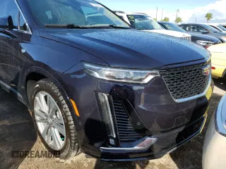 2022 Cadillac XT6 Premium Luxury with VIN 1GYKPFRS4NZ136219, listed as a Copart auction lot 76905874 with 0 mi miles and Non Repairable. Bid and sale history available at carsss.com. Image 5.