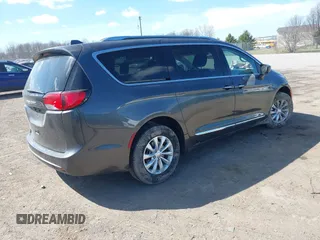 2018 Chrysler Pacifica Touring L with VIN 2C4RC1BGXJR356199, listed as a IAAI auction lot 41886721 with 111,514 mi miles and . Bid and sale history available at DreamBid. Image 4.