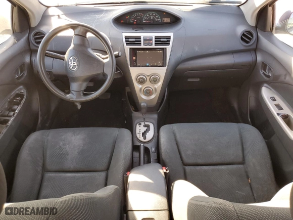 2011 Toyota Yaris with VIN JTDBT4K35B1409879, listed as a Copart auction lot 88090195 with 133,900 mi miles and Salvage Title. Bid and sale history available at carsss.com. Image 8.