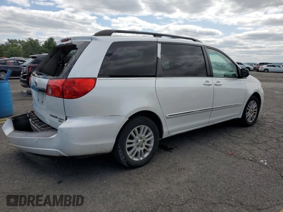 2010 Toyota Sienna XLE с VIN 5TDDK4CC5AS029985, выставлен на аукционе Copart как лот 84182164 с пробегом 232 460 миль миль и Списание • Salvage title. История ставок и продаж доступна на DreamBid. Изображение 3.