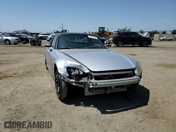 2002 Honda S2000 z VIN JHMAP11442T000235, wystawiony jako Copart lot #59429155 z przebiegiem 142 845 mil mil oraz Szkoda całkowita • Salvage title. Historia ofert i sprzedaży dostępna na DreamBid. Obrazek 13.