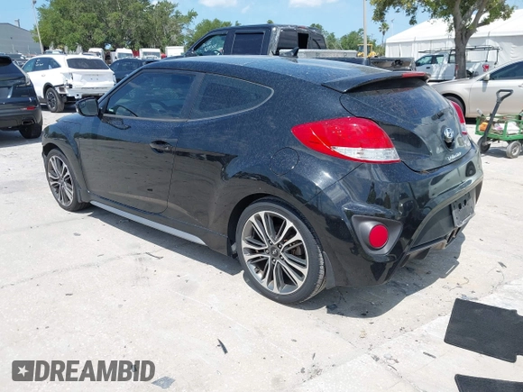 2016 Hyundai Veloster Turbo z VIN KMHTC6AEXGU281207, wystawiony jako IAAI lot #42197497 z przebiegiem 107 431 mil mil oraz . Historia ofert i sprzedaży dostępna na DreamBid. Obrazek 3.