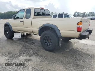 2002 Toyota Tacoma with VIN 5TEWM72N12Z093226, listed as a Copart auction lot 61019955 with 103,657 mi miles and Clean title. Bid and sale history available at DreamBid. Image 2.