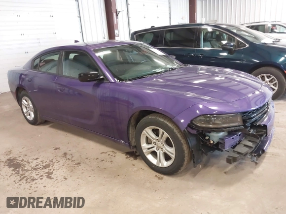 2023 Dodge Charger SXT with VIN 2C3CDXBG1PH571785, listed as a IAAI auction lot 41991323 with 46,563 mi miles. Bid and sale history available at carsss.com. Image 1.