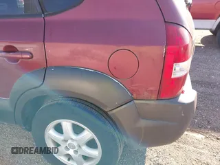 2005 Hyundai Tucson GLS with VIN KM8JN12D85U087248, listed as a IAAI auction lot 42034749 with 209,199 mi miles. Bid and sale history available at carsss.com. Image 6.