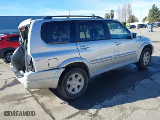 2003 Suzuki XL-7 Touring with VIN JS3TX92V734114162, listed as a IAAI auction lot 41250622 with 227,494 mi miles. Bid and sale history available at carsss.com. Image 4.