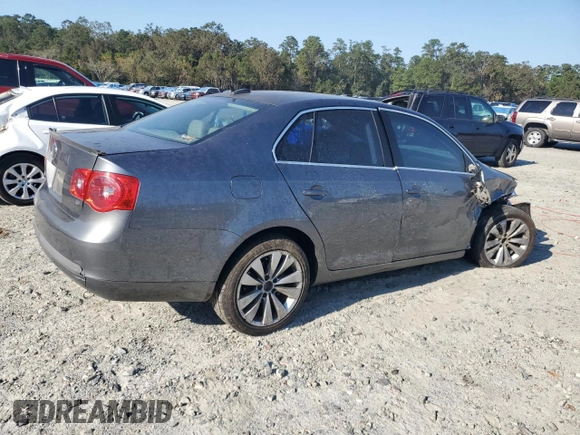2006 Volkswagen Jetta z VIN 3VWDG71K26M673879, wystawiony jako Copart lot #75674634 z przebiegiem 93 689 mil mil oraz Szkoda całkowita • Salvage title. Historia ofert i sprzedaży dostępna na DreamBid. Obrazek 3.