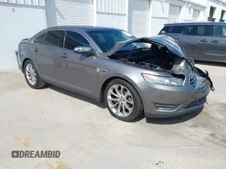2014 Ford Taurus Limited with VIN 1FAHP2F89EG102814, listed as a IAAI auction lot 41999304 with 254,644 mi miles. Bid and sale history available at carsss.com. Image 1.