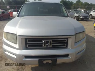 2007 Honda Ridgeline RTL z VIN 2HJYK16537H501200, wystawiony jako IAAI lot #42425662 z przebiegiem 188 618 mil mil oraz . Historia ofert i sprzedaży dostępna na DreamBid. Obrazek 13.