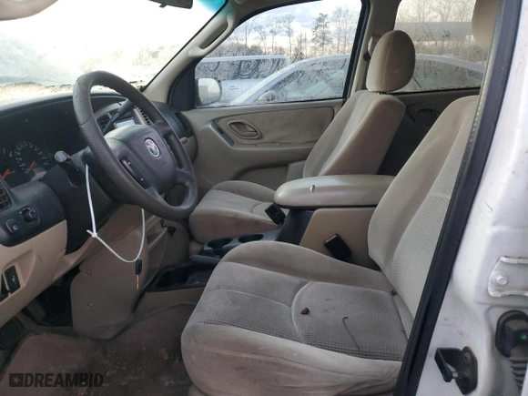 2003 Mazda Tribute LX with VIN 4F2YZ94133KM20084, listed as a Copart auction lot 82598104 with 216,848 mi miles and Salvage Title. Bid and sale history available at carsss.com. Image 7.