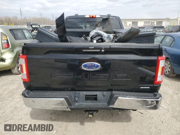 2021 Ford F-150 XL with VIN 1FTFW1E83MFB66545, listed as a Copart auction lot 49702825 with 84,078 mi miles and Salvage title. Bid and sale history available at DreamBid. Image 6.