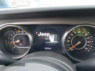 2021 Jeep Gladiator Willys with VIN 1C6HJTAGXML502037, listed as a IAAI auction lot 41225448 with 53,154 mi miles and . Bid and sale history available at carsss.com. Image 7.