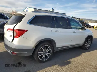 2020 Honda Pilot Touring 7-Passenger z VIN 5FNYF6H68LB002405, wystawiony jako Copart lot #46857625 z przebiegiem 69 617 mil mil oraz Szkoda całkowita • Salvage title. Historia ofert i sprzedaży dostępna na DreamBid. Obrazek 3.