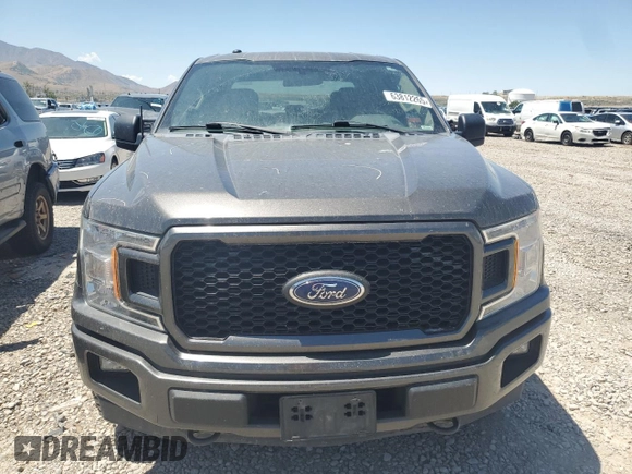 2018 Ford F-150 XL with VIN 1FTEW1EPXJKE71093, listed as a Copart auction lot 63812265 with 122,361 mi miles and Salvage title. Bid and sale history available at DreamBid. Image 5.