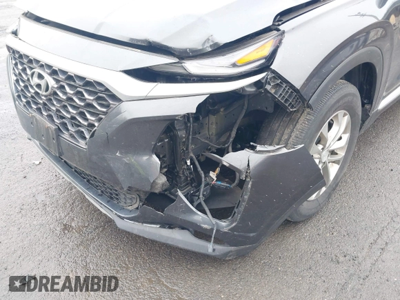 2020 Hyundai Santa Fe SE with VIN 5NMS2CAD8LH258275, listed as a IAAI auction lot 41912687 with 80,467 mi miles and . Bid and sale history available at DreamBid. Image 6.