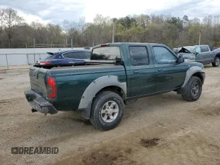 2002 Nissan Frontier SE with VIN 1N6ED27T42C378228, listed as a Copart auction lot 50562975 with 287,368 mi miles and Salvage title. Bid and sale history available at DreamBid. Image 3.