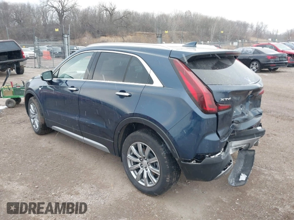 2021 Cadillac XT4 FWD Premium Luxury with VIN 1GYFZCR41MF041306, listed as a IAAI auction lot 41143747 with 53,116 mi miles. Bid and sale history available at carsss.com. Image 3.