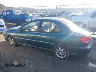 2003 Kia Rio with VIN KNADC125836238197, listed as a IAAI auction lot 41781730 with 138,384 mi miles. Bid and sale history available at carsss.com. Image 14.