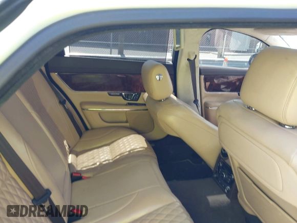 2016 Jaguar XJ Portfolio with VIN SAJWJ2GD8G8W00063, listed as a IAAI auction lot 42076707 with Not provided miles and . Bid and sale history available at DreamBid. Image 8.
