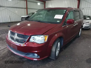2018 Dodge Grand Caravan SXT with VIN 2C4RDGCG4JR297603, listed as a IAAI auction lot 42144645 with 114,098 mi miles and . Bid and sale history available at DreamBid. Image 2.