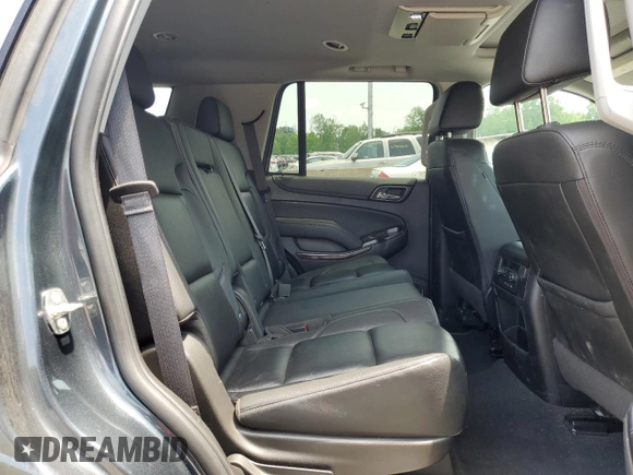 2020 Chevrolet Tahoe LT with VIN 1GNSKBKC0LR260766, listed as a Copart auction lot 61465725 with 104,850 mi miles and Salvage title. Bid and sale history available at DreamBid. Image 11.