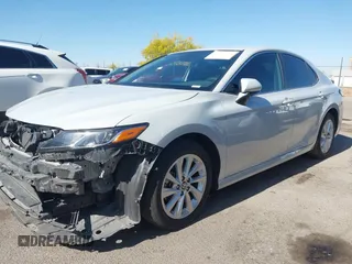 2023 Toyota Camry LE z VIN 4T1C11AK3PU182386, wystawiony jako IAAI lot #42118553 z przebiegiem 38 705 mil mil oraz . Historia ofert i sprzedaży dostępna na DreamBid. Obrazek 2.
