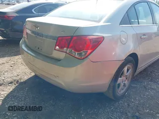 2014 Chevrolet Cruze 1LT with VIN 1G1PC5SB9E7180989, listed as a IAAI auction lot 42230408 with 112,927 mi miles and . Bid and sale history available at DreamBid. Image 6.