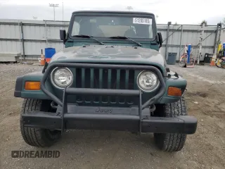 1999 Jeep Wrangler SE with VIN 1J4FY29P0XP420576, listed as a Copart auction lot 51205185 with 101,327 mi miles and Non Repairable. Bid and sale history available at carsss.com. Image 5.