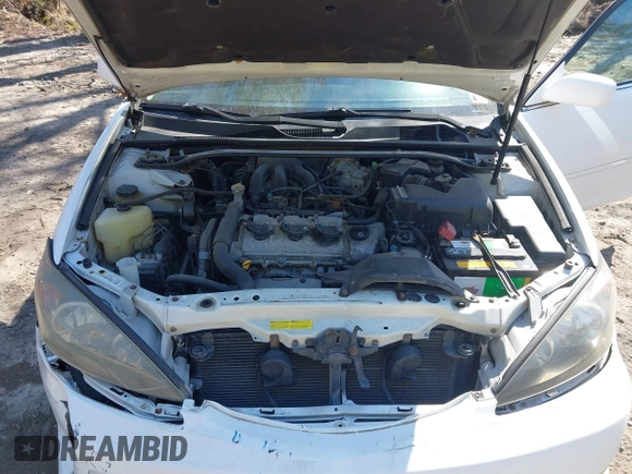 2003 Toyota Camry LE z VIN JTDBF30K930147772, wystawiony jako IAAI lot #41768713 z przebiegiem 231 537 mil mil oraz . Historia ofert i sprzedaży dostępna na DreamBid. Obrazek 10.