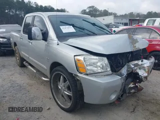 2004 Nissan Titan SE with VIN 1N6AA07A34N534955, listed as a IAAI auction lot 41472051 with 143,579 mi miles and . Bid and sale history available at DreamBid. Image 1.