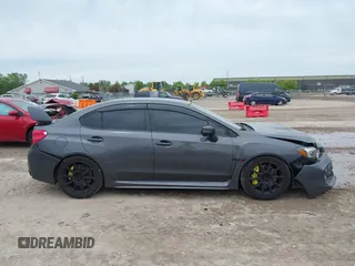 2020 Subaru WRX STI z VIN JF1VA2E65L9800214, wystawiony jako IAAI lot #42356355 z przebiegiem 80 377 mil mil oraz . Historia ofert i sprzedaży dostępna na DreamBid. Obrazek 13.