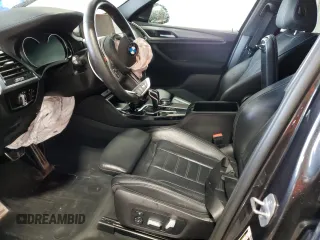 2020 BMW X4 M Competition z VIN 5YMUJ0C05L9B44115, wystawiony jako Copart lot #55556755 z przebiegiem Nie podano mil oraz Szkody całkowita. Historia ofert i sprzedaży dostępna na DreamBid. Obrazek 7.