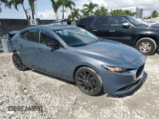 2022 Mazda 3 Carbon Edition с VIN 3MZBPACL3NM318079, выставлен на аукционе Copart как лот 58185015 с пробегом 36 299 миль миль и Списание • Salvage title. История ставок и продаж доступна на DreamBid. Изображение 4.