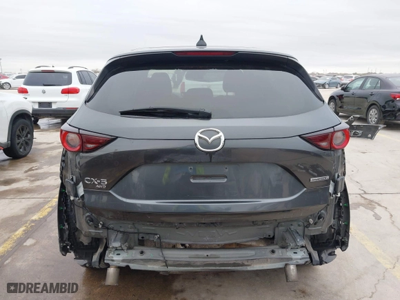 2021 Mazda CX-5 Touring with VIN JM3KFBCM0M0342210, listed as a IAAI auction lot 41236013 with 96,012 mi miles. Bid and sale history available at carsss.com. Image 17.