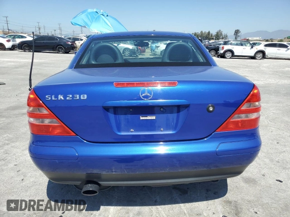 1998 Mercedes-Benz SLK 230/320 with VIN WDBKK47F7WF067901, listed as a Copart auction lot 55122585 with 76,748 mi miles and Salvage title. Bid and sale history available at DreamBid. Image 6.