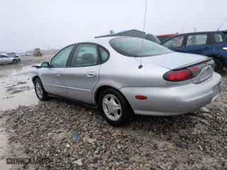 1998 Ford Taurus LX with VIN 1FAFP52U8WG232726, listed as a Copart auction lot 45687605 with 67,793 mi miles and Salvage Title. Bid and sale history available at carsss.com. Image 2.